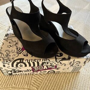Brash Black Peep-Toe Wedges